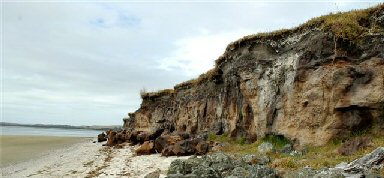 A shot of some cliffs on 90 Mile Beach at Te Hapua